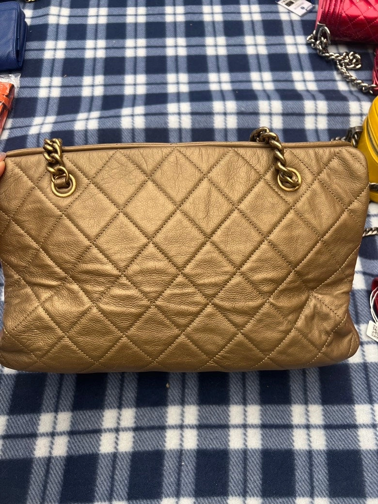 CHANEL Quilted Chain Shoulder Bag in Gold Leather