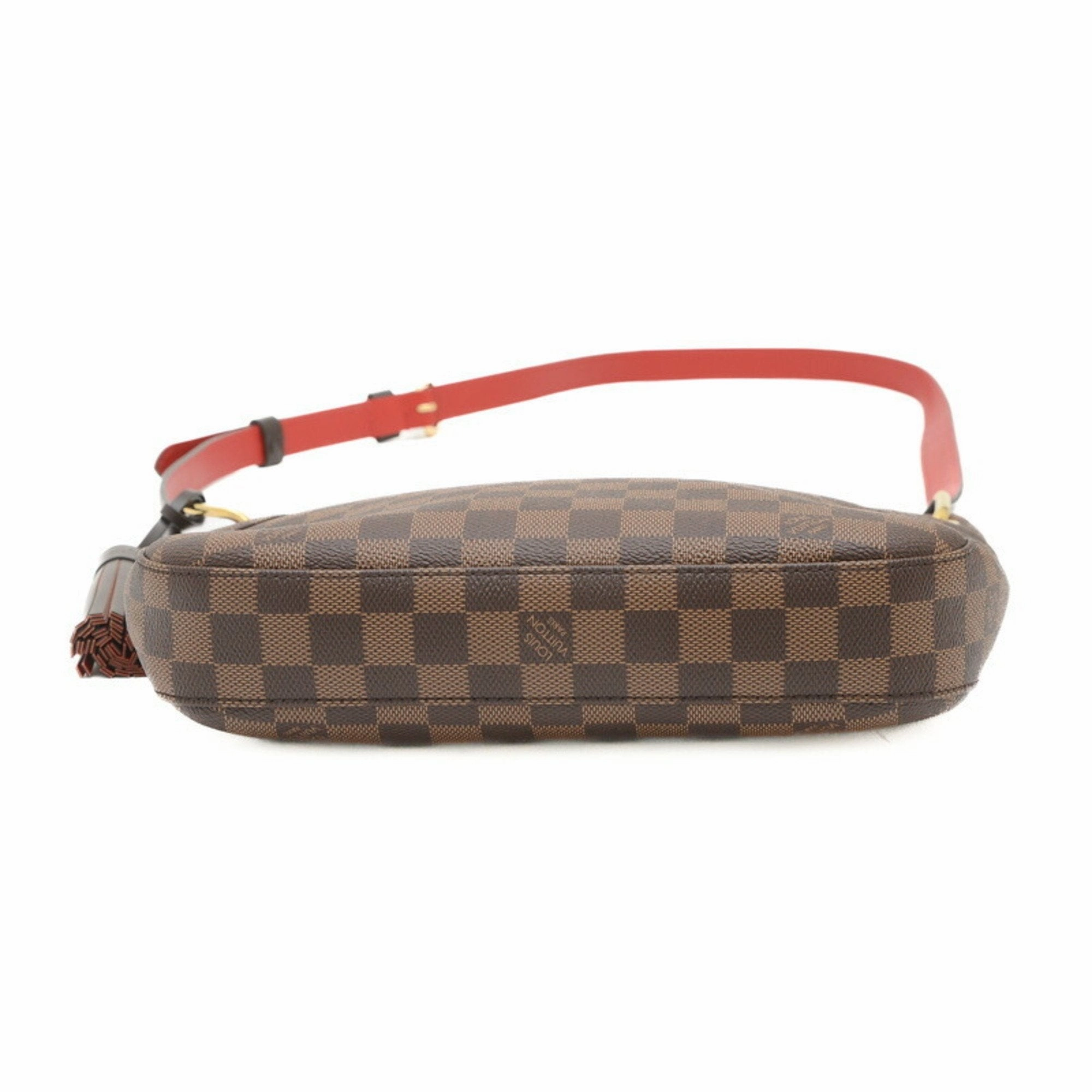Elegant Canvas Shoulder Bag with Charm and Dust Bag Inclusion