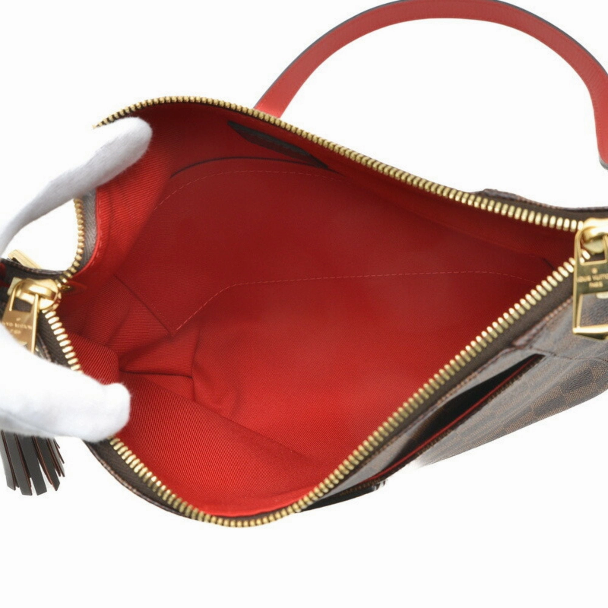 Elegant Canvas Shoulder Bag with Charm and Dust Bag Inclusion