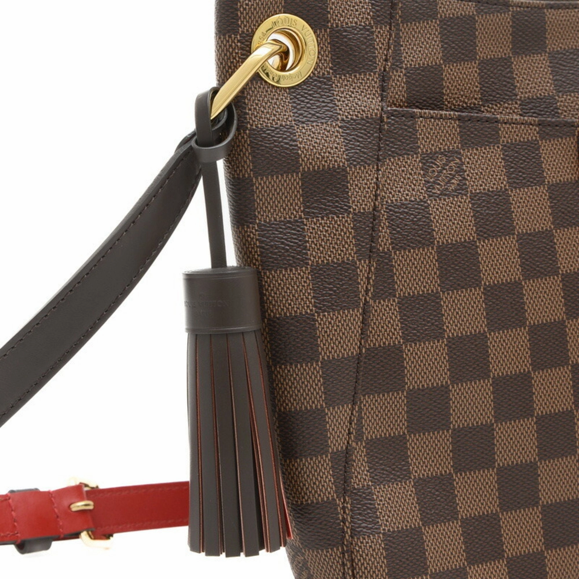 Elegant Canvas Shoulder Bag with Charm and Dust Bag Inclusion