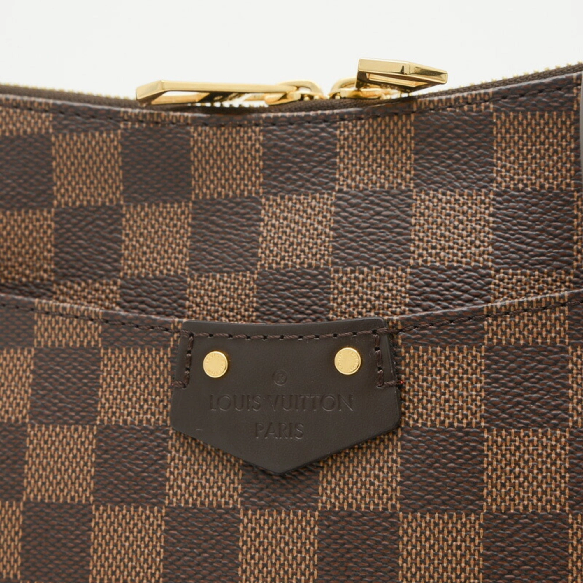Elegant Canvas Shoulder Bag with Charm and Dust Bag Inclusion
