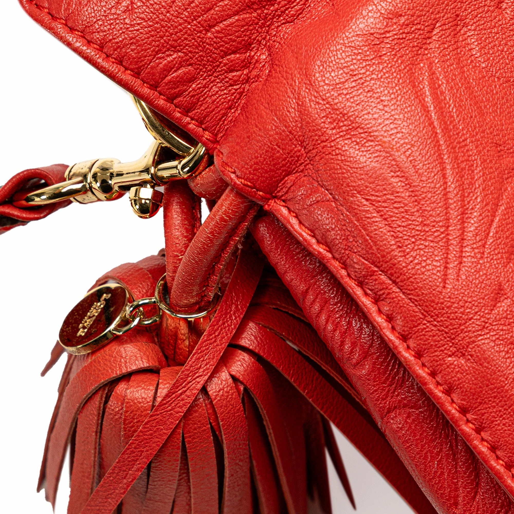 Embossed Flamenco Tassel Crossbody