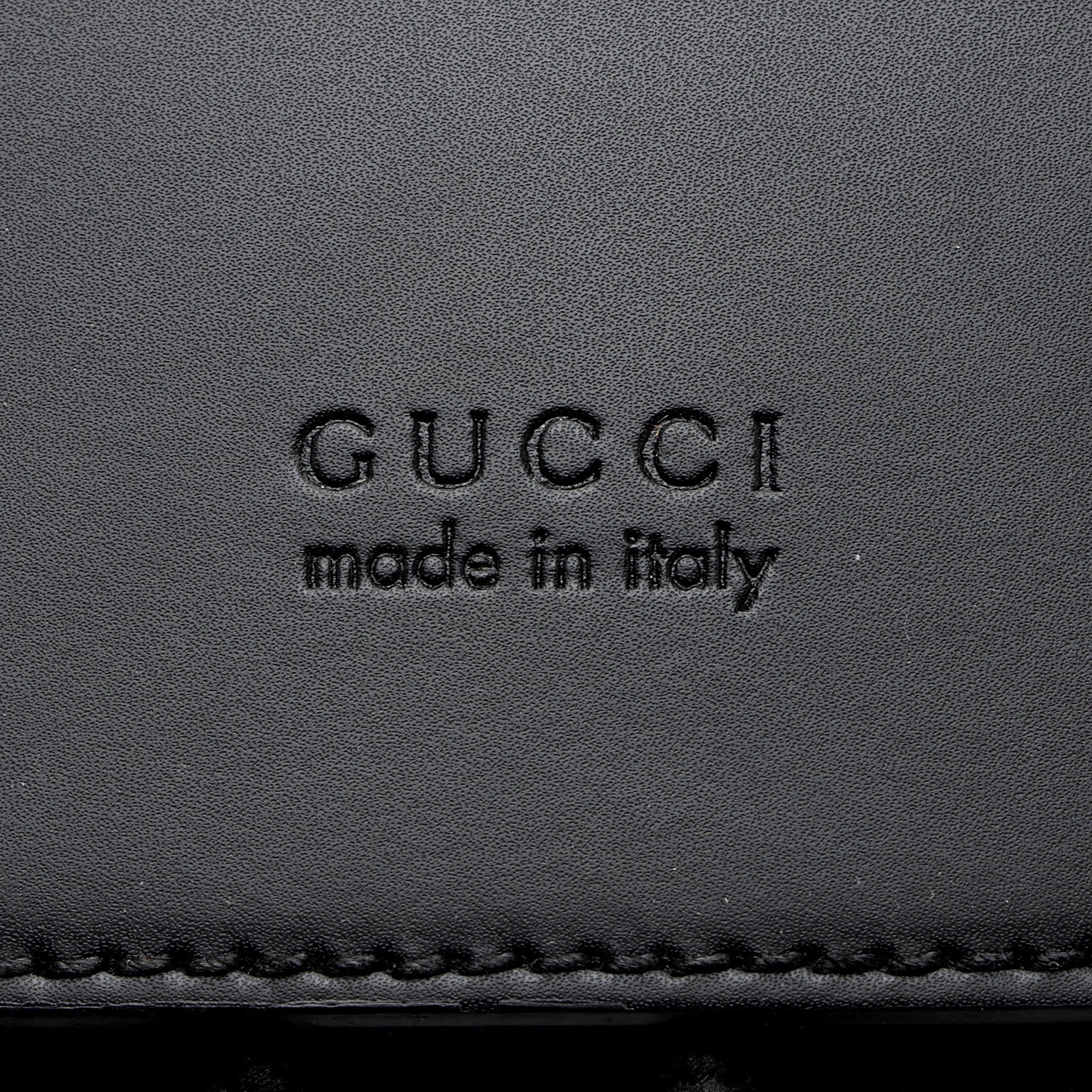 Gucci GG Supreme Medium Flap Backpack (SHF-NNj9Jx)