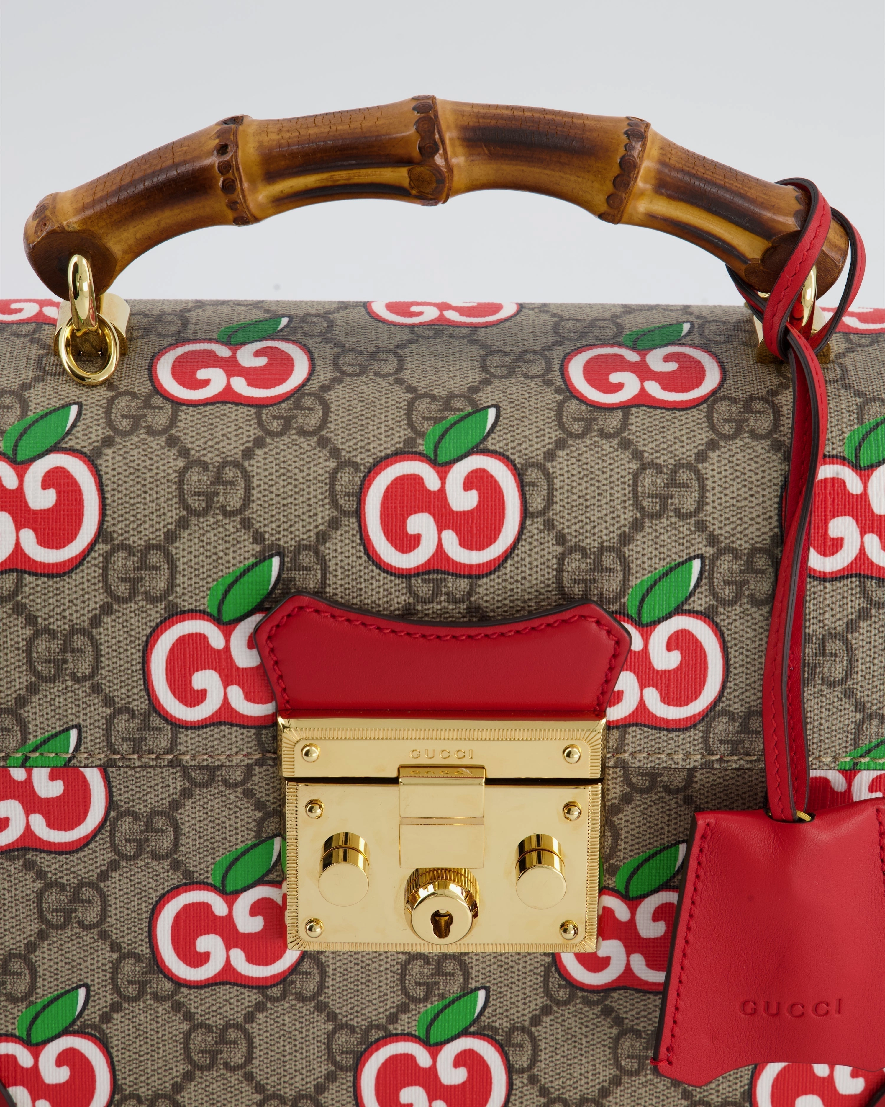 Gucci GG Supreme Padlock Apple Monogram Shoulder Bag with Bamboo Handle and Gold Hardware