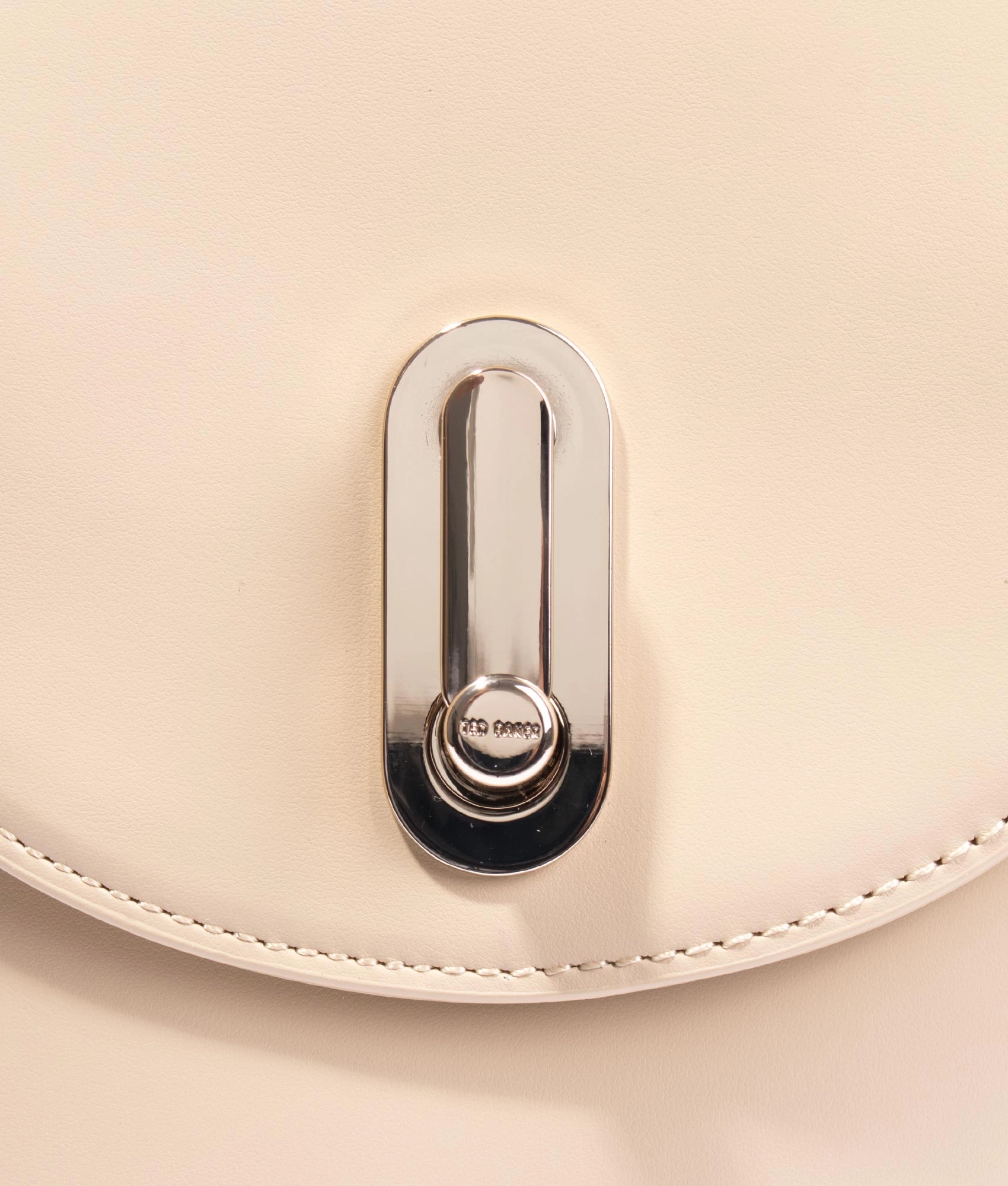 Lattifa asymmetric crossbody in natural