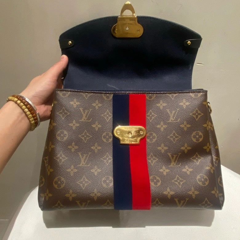 LOUIS VUITTON Monogram Canvas Crossbody Bag with Red and Blue Stripe
