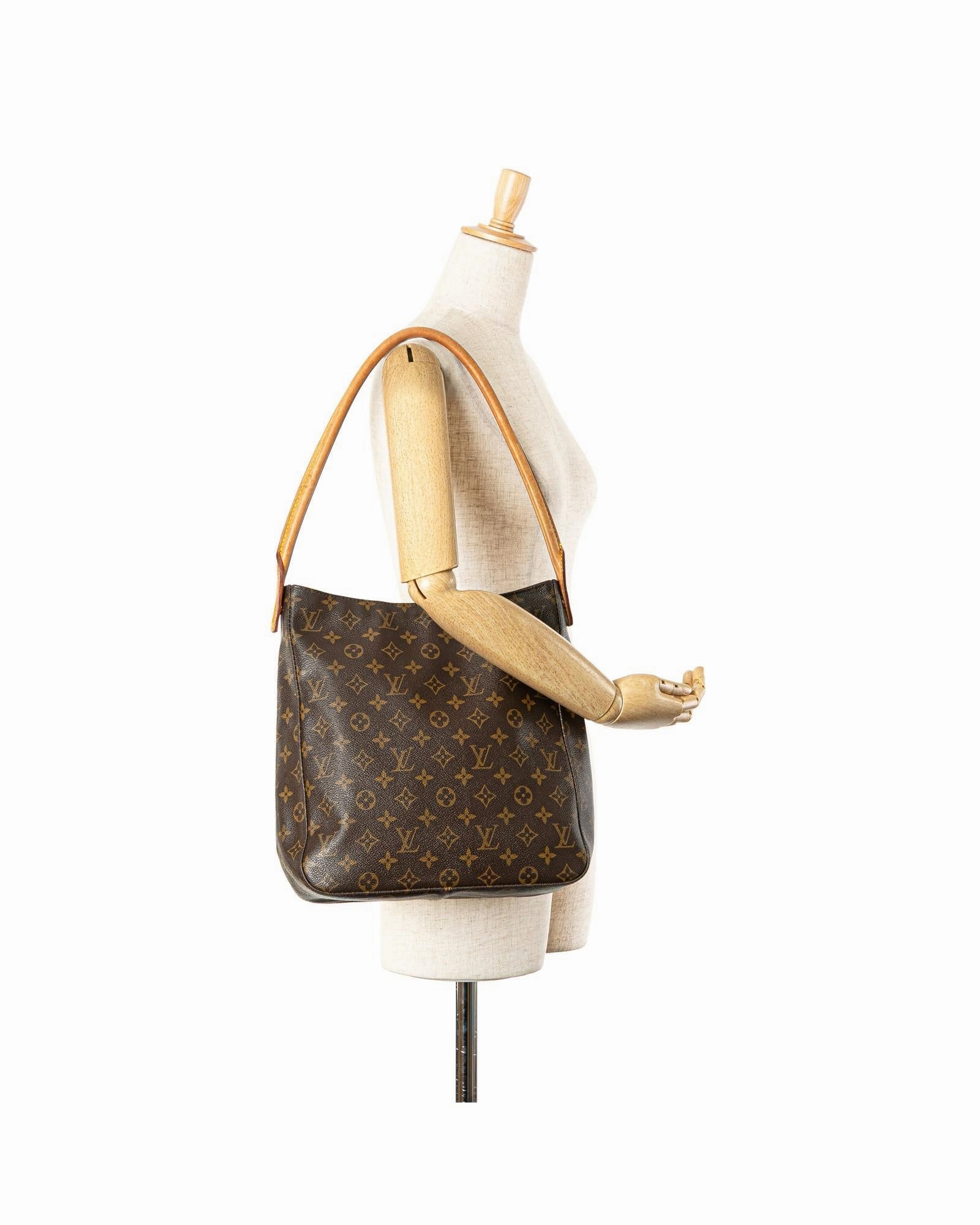 Monogram Canvas Shoulder Bag with Vachetta Leather Strap and Top Zip Closure