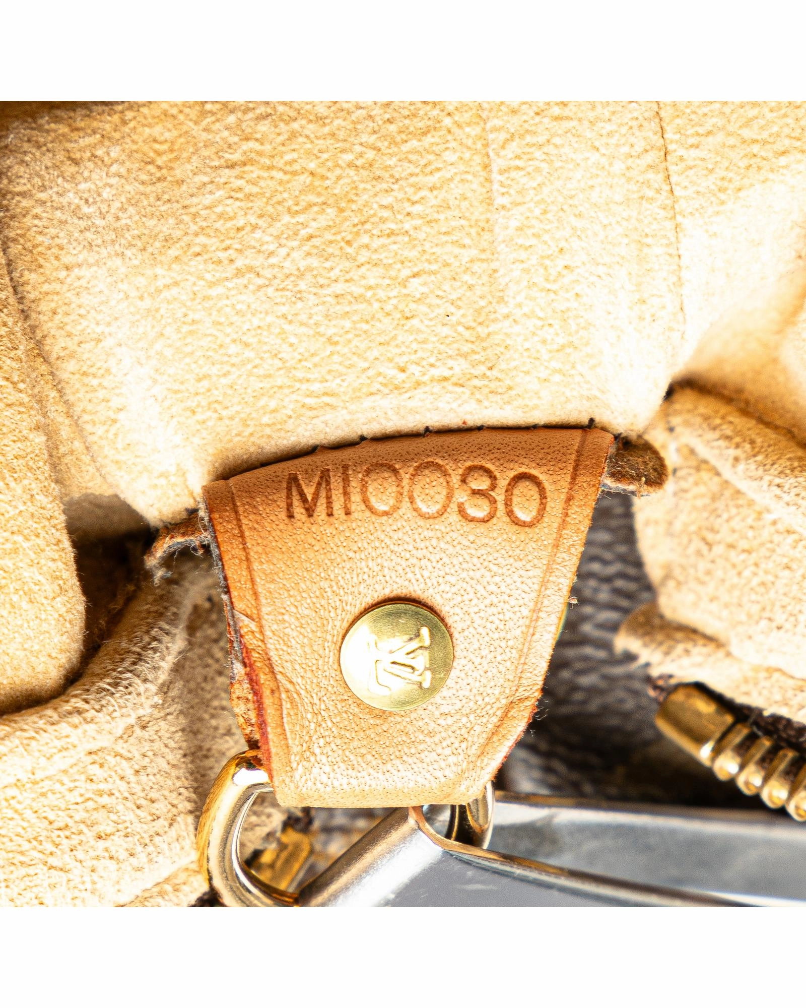 Monogram Canvas Shoulder Bag with Vachetta Leather Strap and Top Zip Closure