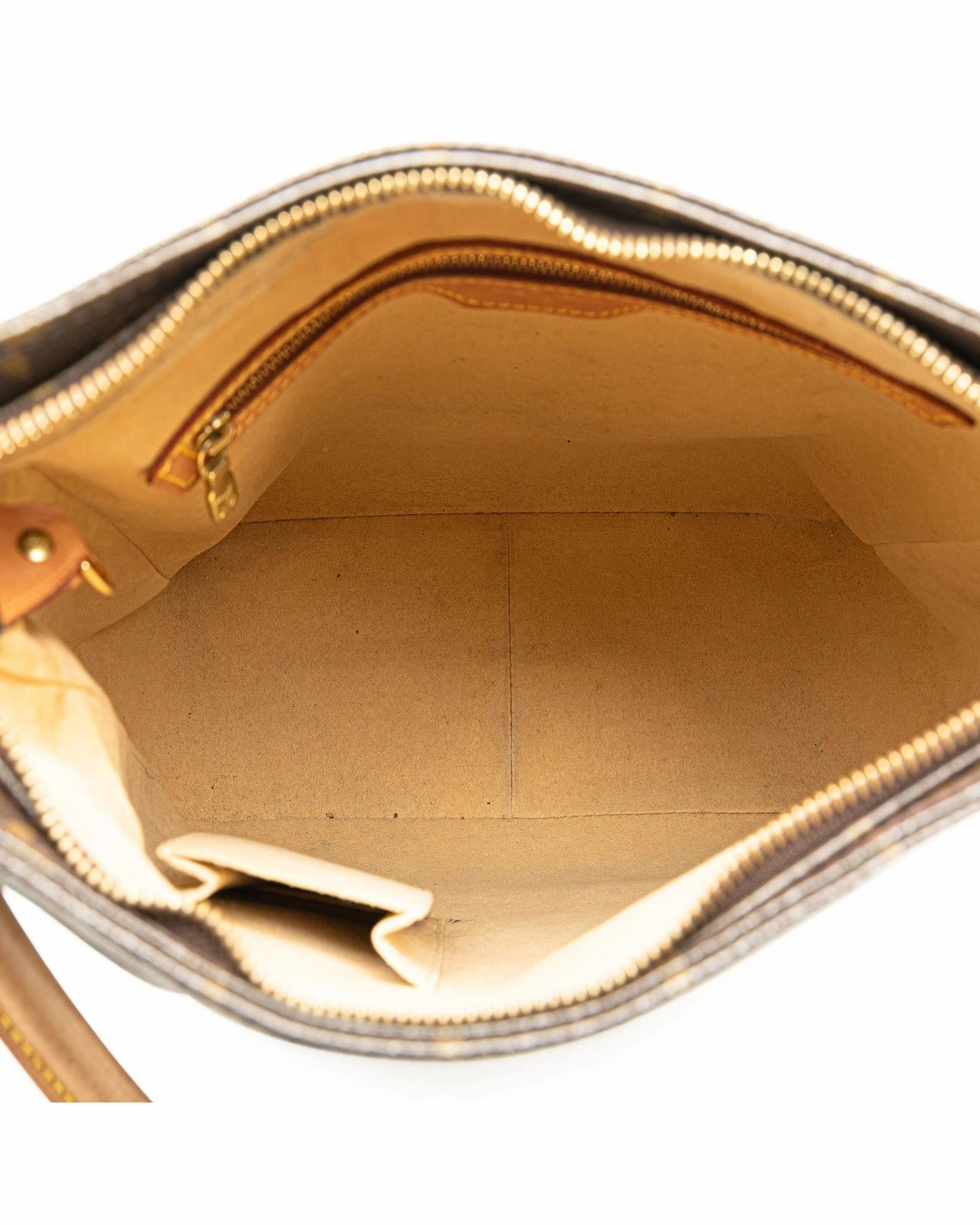 Monogram Canvas Shoulder Bag with Vachetta Leather Strap and Top Zip Closure