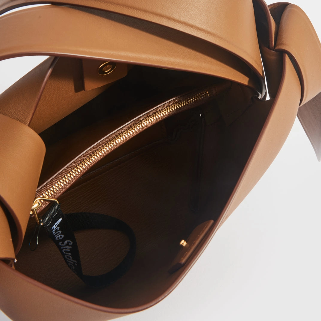 Musubi Mini Knotted Leather Crossbody Bag in Tan