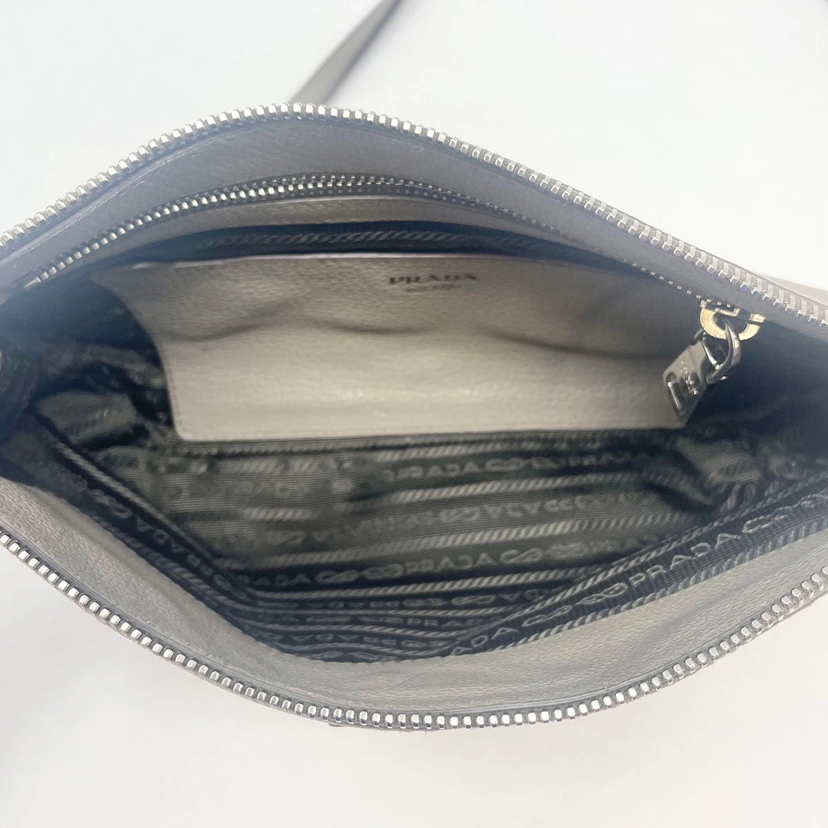 Prada Enameled Metal Triangle Crossbody
