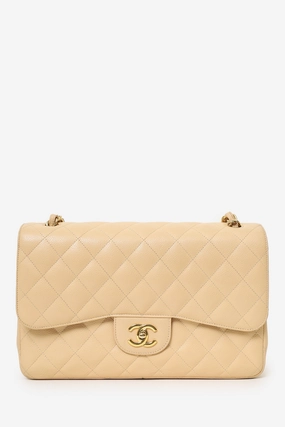 Pre-Loved Chanel 2010-11 Beige Caviar Leather Jumbo Classic Double Flap Bag