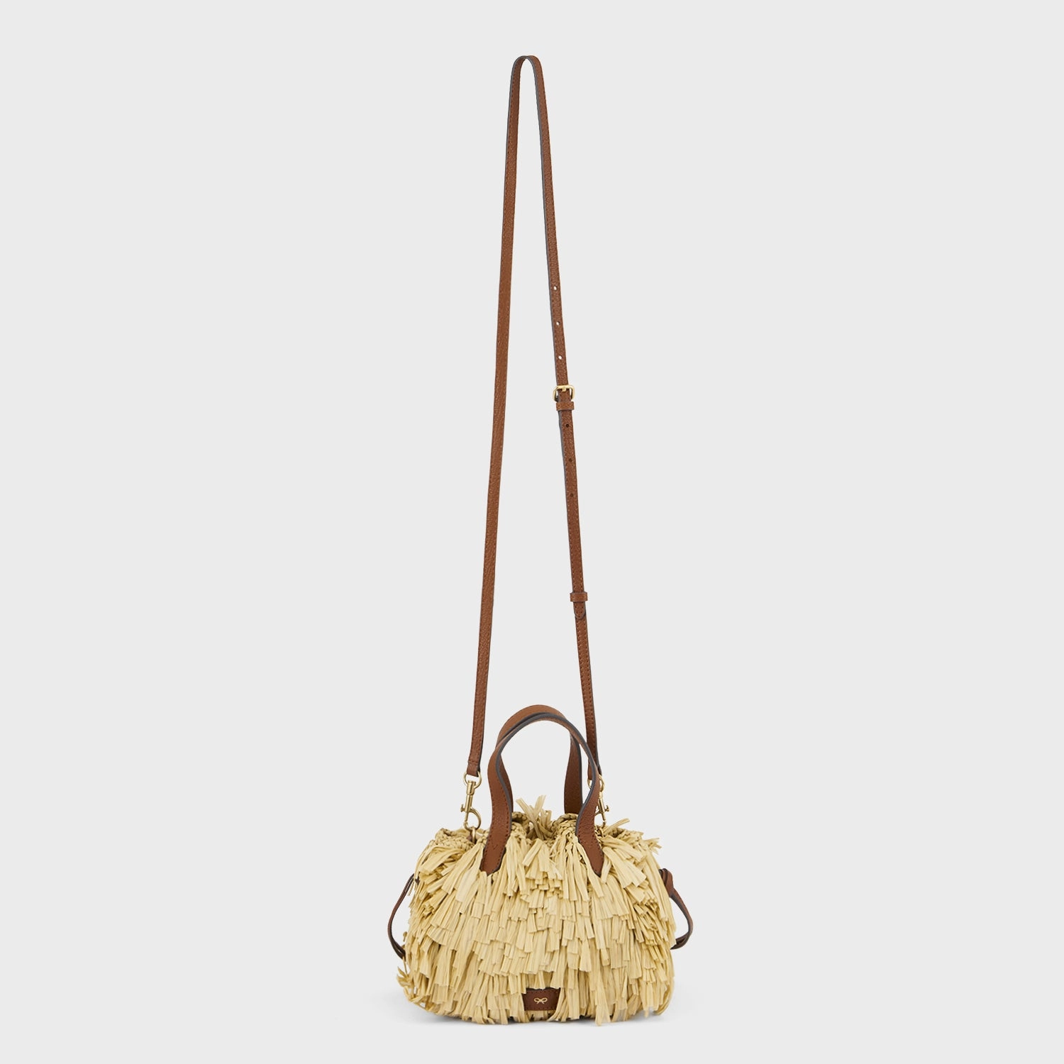 Shag Raffia Eyes Small Drawstring Cross-body Tote